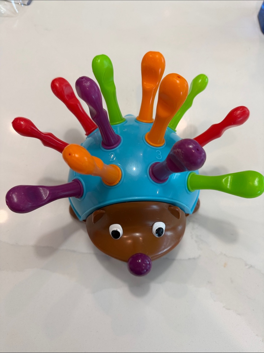 Bright Blue Hedgehog Peg Toy with Multicolor Pegs - Kids Learning Toy